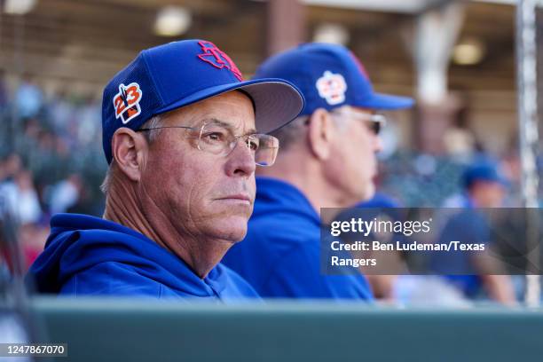 Greg Maddux of the Texas Rangers looks on during a game against the Kansas City Royals as part of the Spring Training at Surprise Stadium on February...