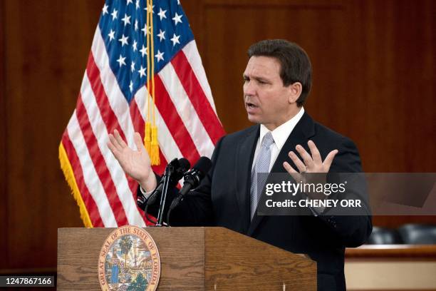 Florida Governor Ron DeSantis answers questions from the media in the Florida Cabinet following his State of the State address during a joint session...