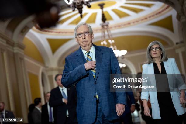 Senate Minority Leader Mitch McConnell and Sen. Joni Ernst arrive for a news conference at the U.S. Capitol on March 7, 2023 in Washington, DC....