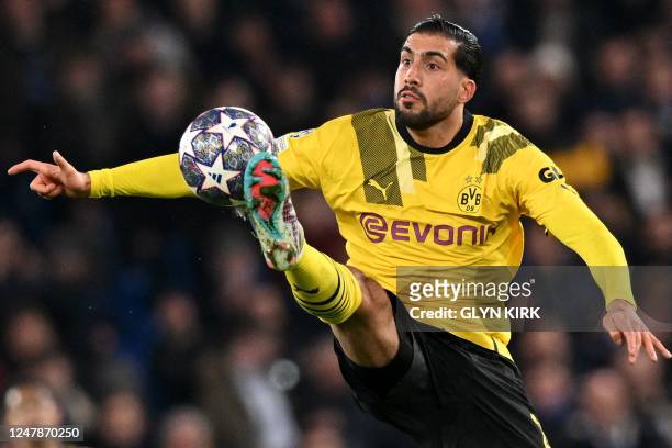 Dortmund's German midfielder Emre Can controls the ball during the UEFA Champions League round of 16 second-leg football match between Chelsea and...