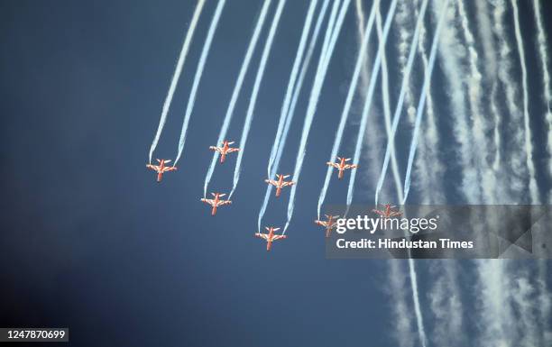 The Surya Kiran aerobatic team of the Indian Air Force displays flares during the air exhibition at Bathinda Air Force Station on March 7, 2023 in...