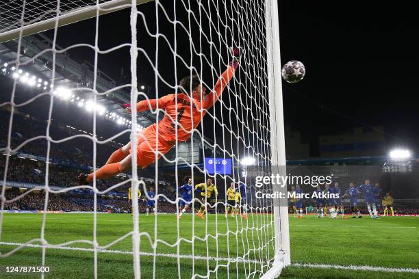 Kepa Arrizabalaga of Chelsea saves a free kick from Marco Reus of Borussia Dortmund during the UEFA Champions League round of 16 leg two match...