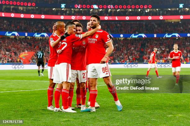 Rafa of Benfica Lissabon celebrates after scoring his team's first goal with teammates during the UEFA Champions League round of 16 leg two match...