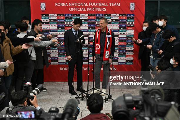 Jurgen Klinsmann , newly appointed head coach of South Koreas national football team, smiles during a press conference after his arrival at the...