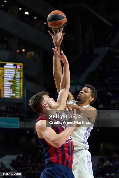 Walter Tavares, #22 of Real Madrid shoots the ball against Maik Kotsar, #21 of Cazoo Baskonia Vitoria Gasteiz during the 2022/2023 Turkish Airlines...