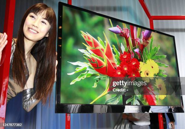 Japan's electronics giant Sharp unveils their prototype model of the world's lightest, thinest and lowest power consuming 52-inch sized LCD...