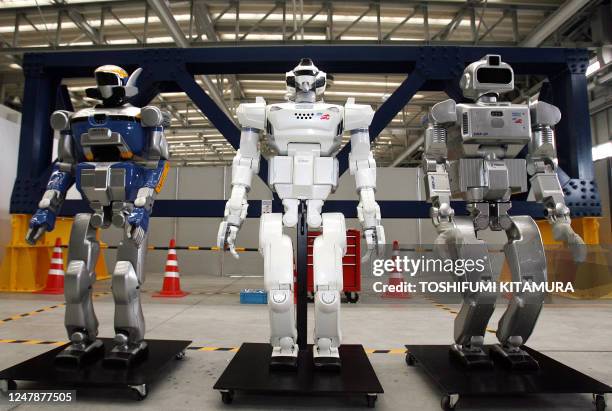Promet Mk-II , HRP-2 Promet and HRP-3 Prototype humanoid robots are diplayed during the Promet Mk-II press preview at Kawada industry's laboratory in...