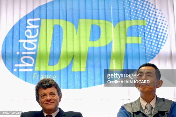 French minister of Labor, Social Cohesion and Housing Jean-Louis Borloo and president of Ibiden DPF France, Japanese Hidetoshi Yamauchi, give a press...