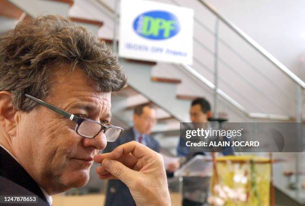 French minister of Labor, Social Cohesion and Housing Jean-Louis Borloo listen to the president of Ibiden DPF France, Japanese Hidetoshi Yamauchi ,...