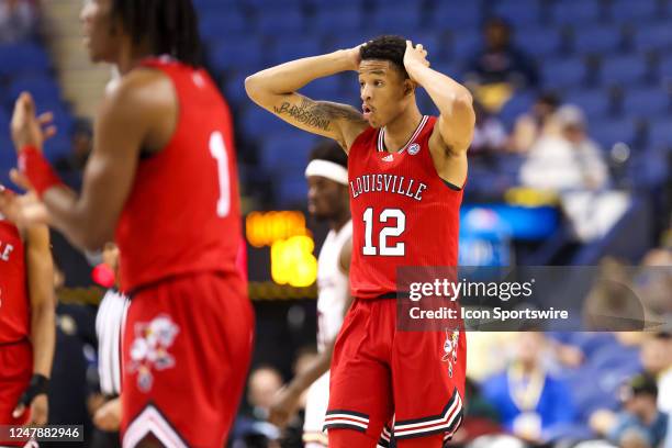 Traynor of the Louisville Cardinals reacts to a call during the ACC Tournament against the Boston College Eagles on March 7, 2023 at Greensboro...