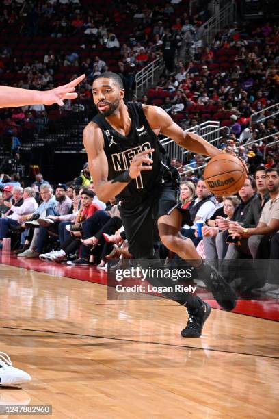 Mikal Bridges of the Brooklyn Nets dribbles the ball during the game against the Houston Rockets on March 7, 2023 at the Toyota Center in Houston,...