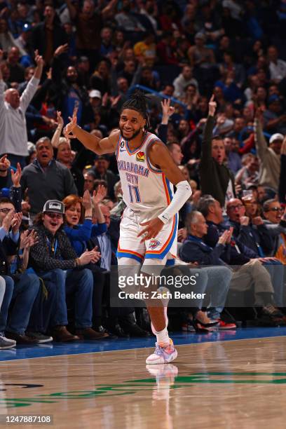 Isaiah Joe of the Oklahoma City Thunder celebrates against the Golden State Warriors on March 7, 2023 at Paycom Arena in Oklahoma City, Oklahoma....
