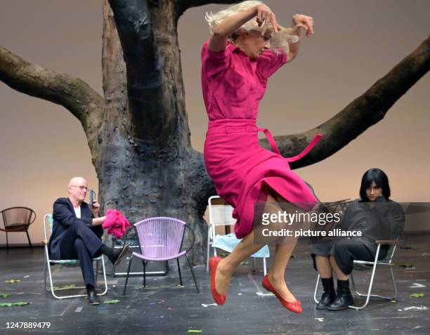 March 2023, Berlin: Actors Stephanie Eidt , Axel Wandtke and Hevin Tekin perform during a rehearsal for the play "The Seagull" at the Schaubühne am...