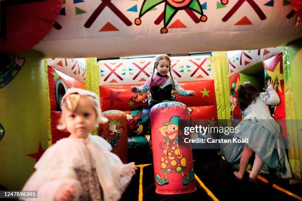 Children play on a bouncy castle at the Jewish festival of Purim at a party in a hotel on March 7, 2023 in Berlin, Germany. Chabad Berlin has taken...