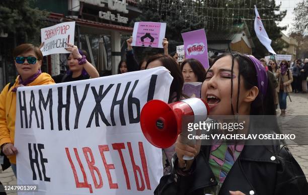 Women take part in a rally to mark the International Women's Day in Bishkek on March 8, 2023.