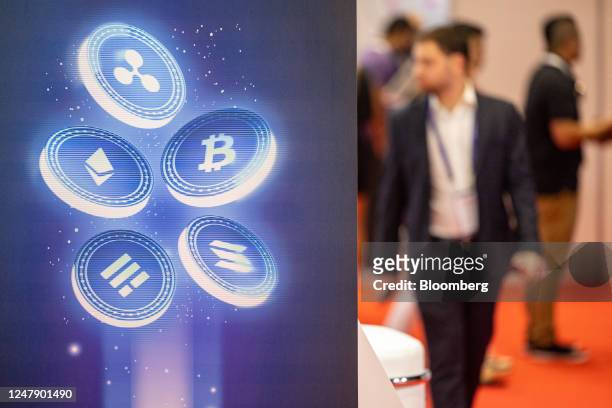 The logos of Ripple, Ethereum, Bitcoin, Binance USD and Solana coins on display during the Dubai Crypto Expo at the Festival Arena in Dubai, United...