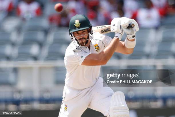 South Africa's Aiden Markram watches the ball after playing a shot during the first day of the second Test cricket match between South Africa and...