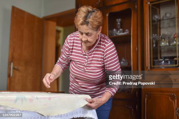 when grandma cooking it is always with love - counter surface level stock pictures, royalty-free photos & images