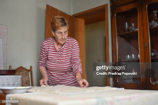 when grandma cooking it is always with love - counter surface level stock pictures, royalty-free photos & images