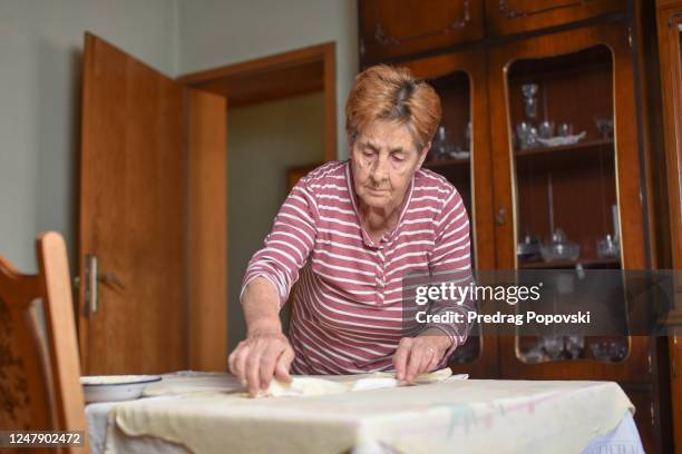 when grandma cooking it is always with love - counter surface level stock pictures, royalty-free photos & images