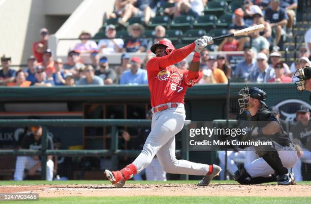 Jordan Walker of the St. Louis Cardinals bats during the Spring Training game against the Detroit Tigers at Publix Field at Joker Marchant Stadium on...