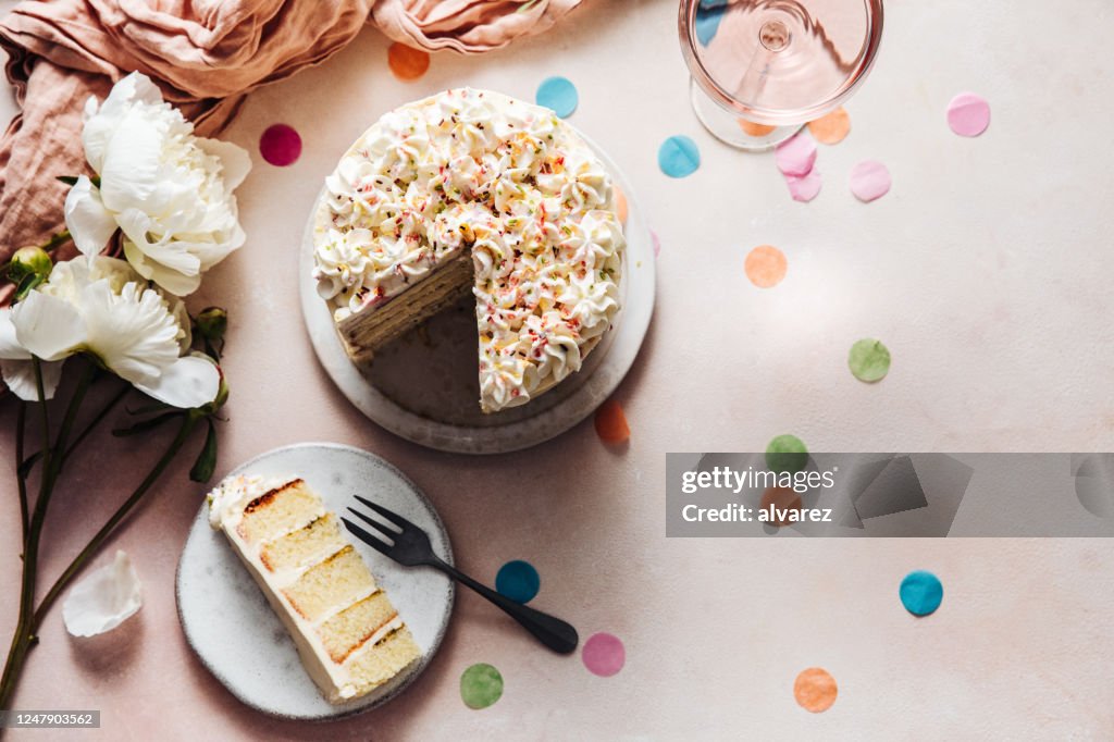 Slice of a birthday cake on plate