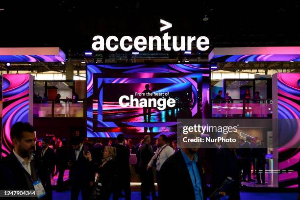 Congress visitors passing by the Accenture stand, the Irish-American information technology services and the largest consulting company, during the...