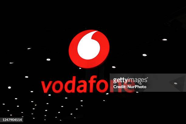 The Vodafone Group Pic logo, the British multinational telecommunications company, displayed on their stand during the Mobile World Congress 2023 on...