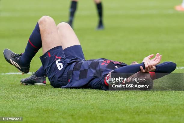 Luuk de Jong of PSV lies on the ground injured during the Eredivisie match between RKC Waalwijk and PSV Eindhoven at the Mandemakers Stadion on March...