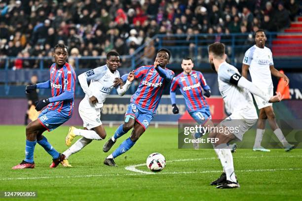 Hiangaa MBOCK - 70 Moussa DOUMBIA - 91 Emmanuel NTIM during the Ligue 2 BKT match between Caen and Sochaux at Stade Michel D'Ornano on March 6, 2023...