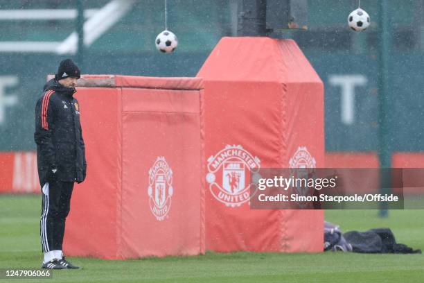 Manchester United manager Erik ten Hag looks on during a training session ahead of their UEFA Europa League round of 16 leg one match against Real...