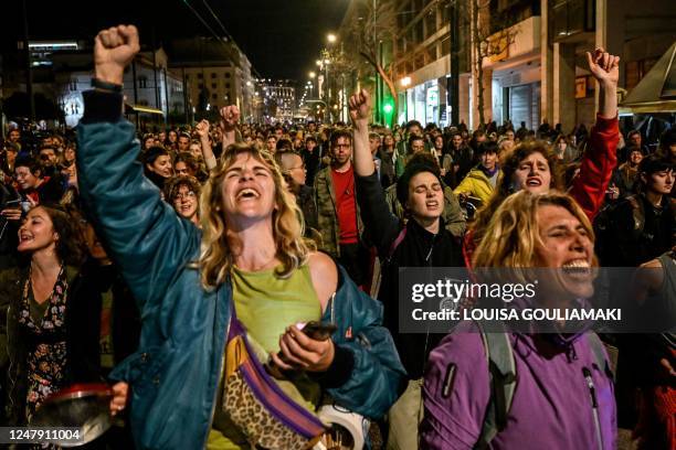 Women chant slogans during a rally to mark the International Women's Day as multiple demonstrations took place during a nationwide day of mass...