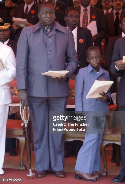 Idi Amin, president of Uganda and his son Moses , at the funeral of Kenya President Jomo Kenyatta at St Andrew's Church in Nairobi, Kenya, on 31st...