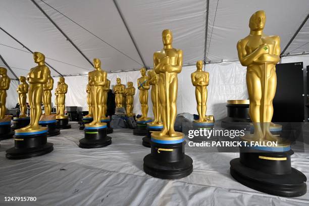 Oscar statues await painting for the 95th Oscars along Hollywood Boulevard during preparations for the Academy Awards on March 8, 2023 in Los...