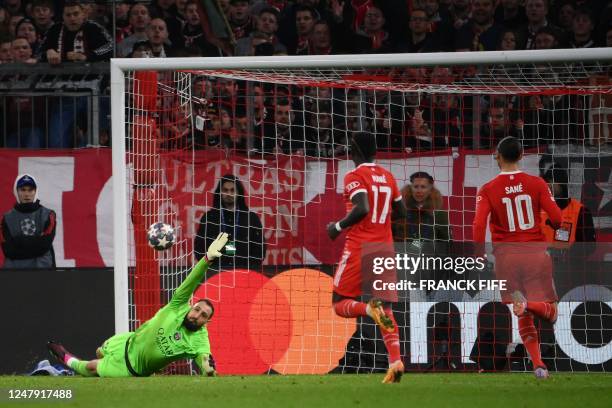 Paris Saint-Germain's Italian goalkeeper Gianluigi Donnarumma fails to save the 2-0 during the UEFA Champions League round of 16, 2nd-leg football...