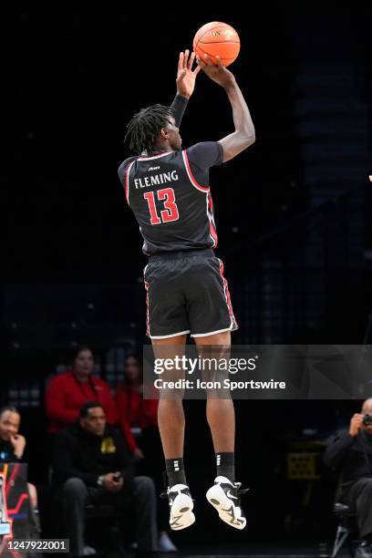 St. Joseph's Hawks Forward Rasheer Fleming shoots a three point jump shot during the first half of the Atlantic 10 Mens College Basketball Tournament...