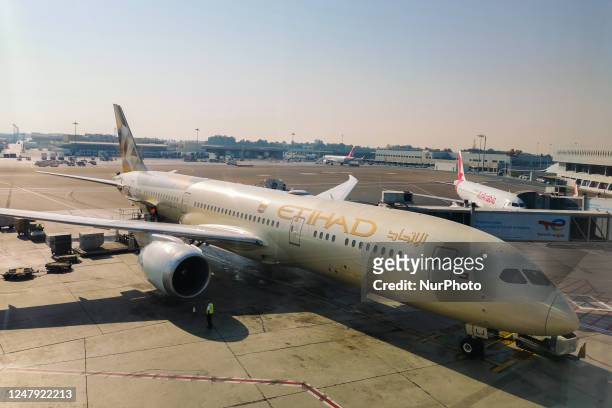 An Etihad Airways Boeing 787-9 is seen at Abu Dhabi International Airport in Abu Dhabi, United Arab Emirates on March 6, 2023.