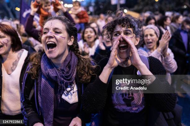 Demonstrators attend an International Women's Day demonstration in Madrid, Wednesday, March 8, 2023.