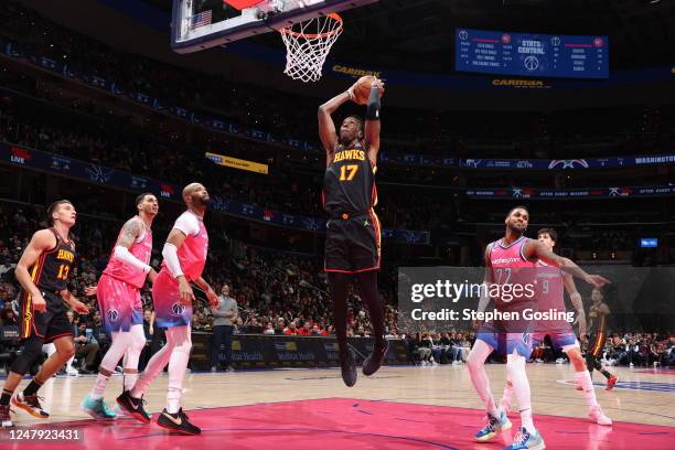 Onyeka Okongwu of the Atlanta Hawks dunks the ball during the game against the Washington Wizards on March 8, 2023 at Capital One Arena in...