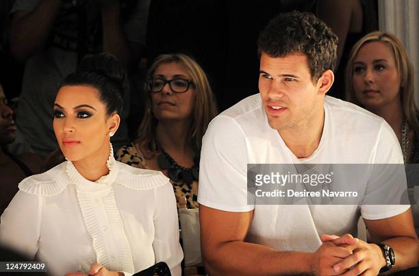 Kim Kardashian and Kris Humphries attend the Abbey Dawn by Avril Lavigne Spring 2012 fashion show during Style360 on September 12, 2011 in New York...