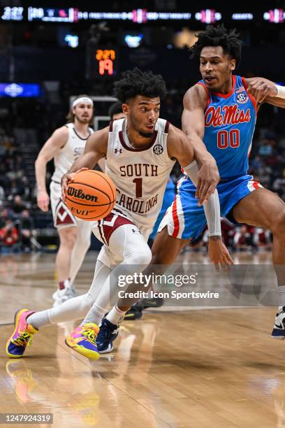 South Carolina Gamecocks guard Jacobi Wright drives around Mississippi Rebels forward Jayveous McKinnis during an SEC Mens Basketball Tournament game...