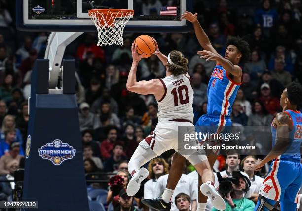 South Carolina Gamecocks forward Hayden Brown drives to the basket around Mississippi Rebels forward Jaemyn Brakefield during an SEC Mens Basketball...