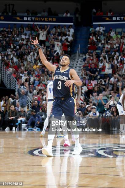 McCollum of the New Orleans Pelicans celebrates after a play during the game against the Dallas Mavericks on March 8, 2023 at Smoothie King Center in...
