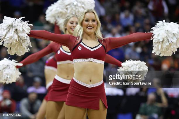 Oklahoma Sooners cheerleaders perform in the first half of a Big 12 Tournament basketball game between the Oklahoma Sooners and Oklahoma State...