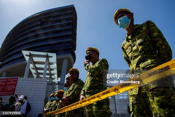 Members of security outside the Malaysian Anti-Corruption Commission headquarters in Putrajaya, Malaysia, on Thursday, March 9, 2023. Former...