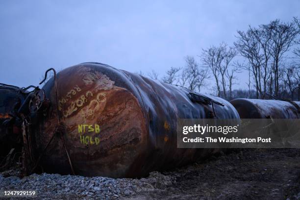 East Palestine, OH Damaged tanks from the derailed train remain on site in East Palestine, Ohio, pending investigations.