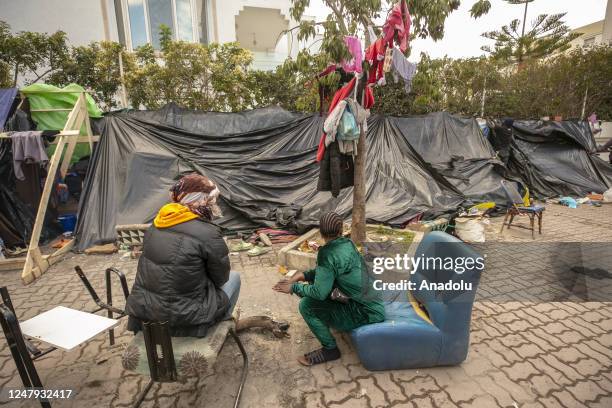 Dozens of African immigrants, who have settled in the al-Buhaire region in the north of the capital Tunis of Tunisia continue their lives on the...