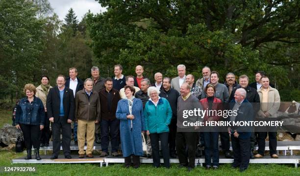 Agriculture ministers pose for a family photo during an informal meeting of agriculture and fisheries ministers in Vaxjo, Sweden, on September 14,...