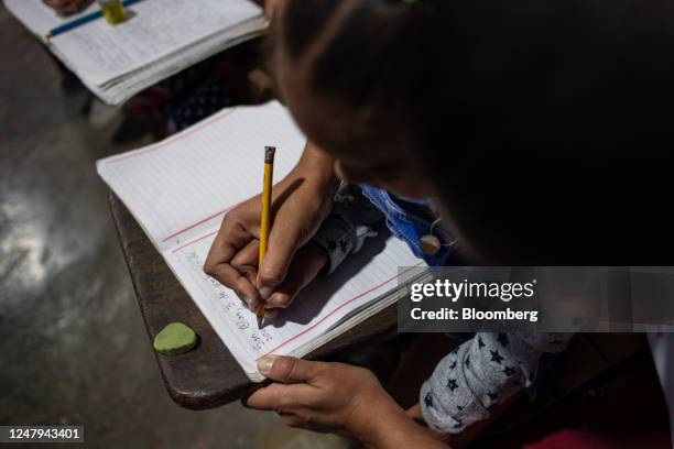 Child during a private school lesson at a home in the Petare neighborhood of Caracas, Venezuela, on Friday, Feb. 3, 2023. Protests led by public...