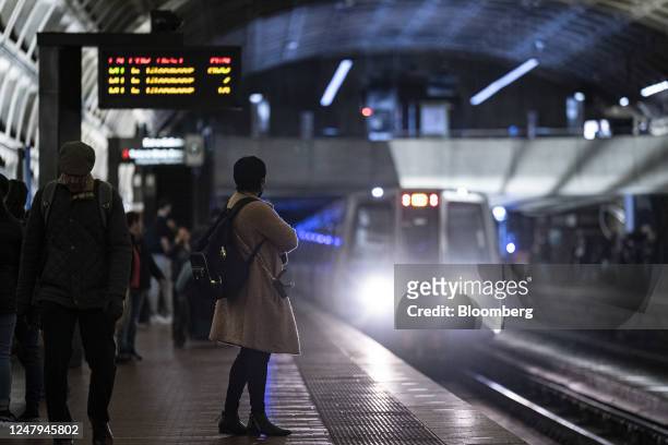 Commuter on the red line Metro train platform during evening rush hour at the Gallery Place Chinatown station in Washington, DC, US, on Wednesday,...
